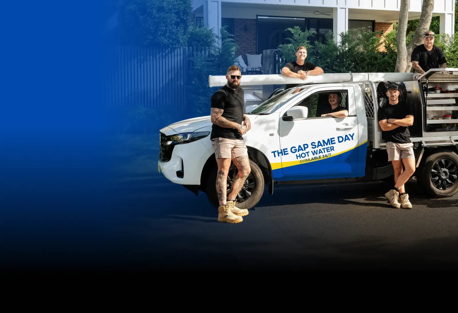 The Gap Same Day Hot Water team with the ute